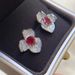 Cao Shi Live Broadcast Light Luxury Micro Inlaid Autumn And Winter New Flower Petals Female Earrings_ipsvogv.com