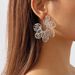 11337 Spring/Summer Unique Design Sense Geometric with Hollow Texture Flower and Metal Earrings_ipsvogv.com