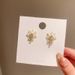 Korean flower pearl simple temperament unique niche high end design fairy earrings price adjustment_ipsvogv.com