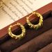 Light luxury temperament circle personality element circle, high-end feeling, green zirconium earrings, fashionable_ipsvogv.com