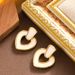 Elegant Hollowed Out Heart-shaped Pendant With Feminine Temperament, Simple And High-end Silver Needle Earrings_ipsvogv.com