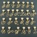 Hip Hop Flower Grass Body 26 English Letter Pendant Necklace Heart Button Full Diamond Cuban Chain Accessories_ipsvogv.com