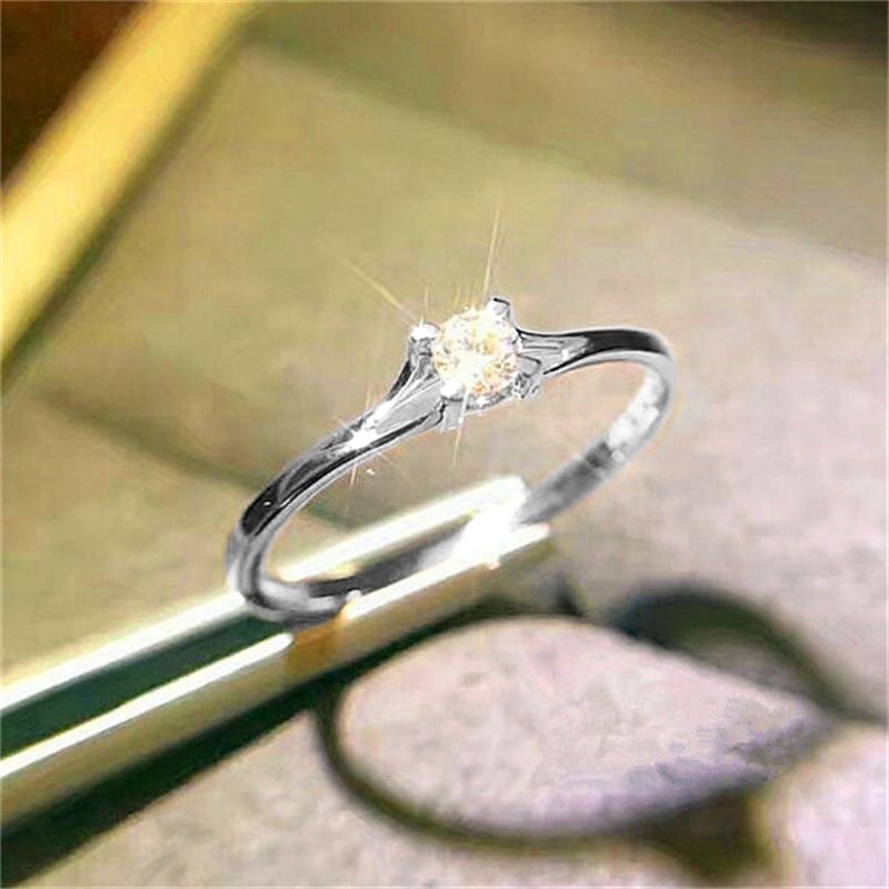 Cao Shi's Classic Four Claw Hot Selling Handpiece Fashion OL Extremely Simple Style Zircon Women's Copper Plated White_ipsvogv.com