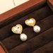 Qingdao jewelry pearl high-end feeling women's love mosaic glass s silver needle earrings_ipsvogv.com