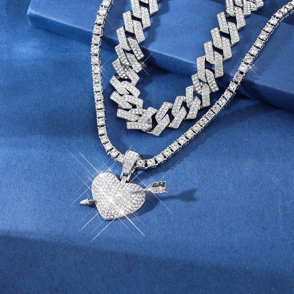 One arrow piercing full diamond heart zinc alloy pendant with a high-end feel, Cuban chain, men's and women's hip-hop_ipsvogv.com