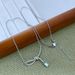 New Fashion Light Luxury Simple Elegant Inlaid Super Shiny Zircon Aurora Ribbon Knot Small Sugar Cube Clavicle Chain_ipsvogv.com