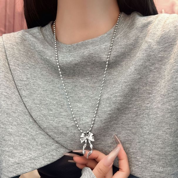 Autumn New Korean Silver-Plated Matte Silver Ribbon Bowknot Dynamic Pearl Necklace Sweater Chain For Women With High-End_ipsvogv.com