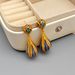 trendy water drop carved enamel Chinese a sense of luxury, niche, and high-end. Light luxury ancient style earrings with_ipsvogv.com