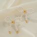 INS Simple Versatile Pearl Shell Bowknot For Women French Style High-end Handmade Woven Stud Earrings_ipsvogv.com