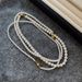 Shi Jia'ao White Xiaomi Beads Magnetic Pearl Necklace Accessories For Women's Light Luxury And Extraordinary Collarbone_ipsvogv.com