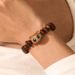 New Chinese Style Handmade Natural Real Coffee Bean Bracelet Elastic Sandalwood Coconut Chips Wood Splicing Woven Hand Jewelry Bracelet For Women_ipsvogv.com