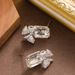 Exquisite Fashionable Zircon Bow With Diamond Inlay, Feminine Temperament, Simple And High-end Silver Needle Earrings_ipsvogv.com