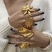 R0920 Autumn/Winter New Flower Sun Leaf Temperament Metal Women's Ring Light Luxury Style Exquisite Handpiece_ipsvogv.com