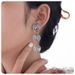 stainless steel personality round thread line winding earrings female hot selling titanium steel earrings_ipsvogv.com