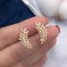 Caoshi French Flower Earrings Temperament Celebrity Feather Zircon Earrings Fashion Versatile Bride Jewelry_ipsvogv.com