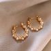 Gold white pearl ear buckle niche design light luxury high-grade sense of temperament earrings explosive autumn-winter vegetarian ring earrings girl_ipsvogv.com