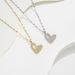 Micro inlaid cat's eye stone full of diamonds, love and color resistant titanium steel necklace, simple and fashionable_ipsvogv.com