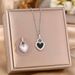 Light Luxury Stainless Steel Peach Pendant With Niche Design, Double-sided Black And White Heart Necklace, Collarbone_ipsvogv.com