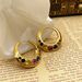 Ins style metal earrings with exaggerated inlay of colorful zircon large earrings, high-end feeling, niche ear buckle_ipsvogv.com