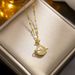 Light luxury micro-inlaid real gold Opal planet necklace women's new clavicle chain light luxury niche design sense_ipsvogv.com