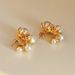 Fashionable Ins Plated Titanium Steel Retro Flower Stamen Pearl Small Earrings_ipsvogv.com