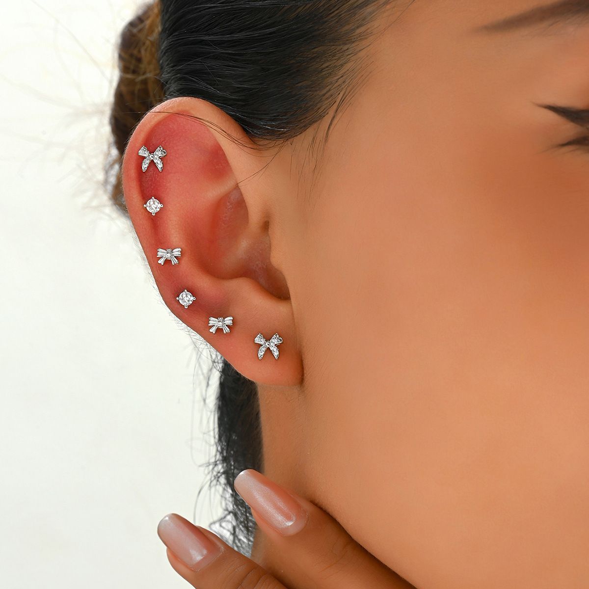 Ins Korean version sweet and fresh zircon inlaid women's earring set, niche bow design earrings_ipsvogv.com