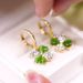 Green Cat's Eye Four Leaf Clover Earrings Exquisite Light Luxury Niche Ear Clips Net Celebrity High End Earrings_ipsvogv.com