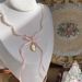 White Peach Dream" Pearl Bowknot Ribbon Necklace Exquisite Elegant Sweet Dreamy 2024 New Arrival_ipsvogv.com