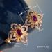 Cao Shi's Italian Four Leaf Grass for Women's Advanced Flower shaped Earrings in Palace Style_ipsvogv.com