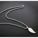 Singer Rap Student Hairstylist Nightclub Hip Hop Angel Wings Feather Pendant Titanium Steel Men's And Women's Necklace_ipsvogv.com