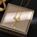 Tassel bow, zircon, small water droplets, titanium steel necklace, versatile for women, new trendy and niche design,_ipsvogv.com