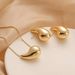 Fashionable water droplet design earring set for women, versatile and niche, long necklace with geometric earrings_ipsvogv.com