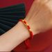 Copper Alloy Adjustable Pulling Bracelet Red Lucky Bead Soft Rope Ring Female Style_ipsvogv.com