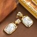 Fashionable And Exquisite Baroque Shaped Pearl Earrings, 2025 New Style, High-end Silver Needle Earrings_ipsvogv.com