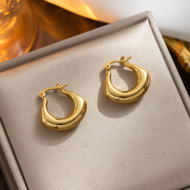 Wind geometric shape gold circle temperament earrings for women 2023 niche new copper plated earrings_ipsvogv.com
