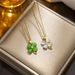 Lucky four-leaf clover necklace women's gold-plated cat's eye exquisite petal clavicle chain simple temperament women's new necklace_ipsvogv.com