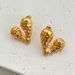 Spot Fashionable Niche INS Titanium Vintage Peach Heart Embossed Symmetrical Versatile Earrings_ipsvogv.com