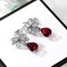 Cao Shimao's New Product Features Pear Shaped Red With Water Droplets Embedded. The Earrings Are Full Of Diamonds And_ipsvogv.com