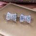 Cao Shi's Korean Edition Simple Bow Jewelry Three Piece Plating Zircon Set Fashion Women's Accessories_ipsvogv.com