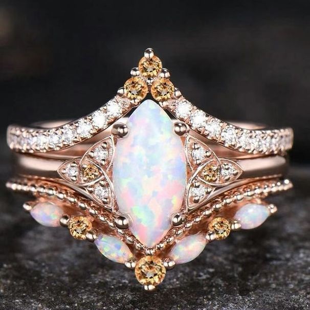 Sanjie's New Alloy Inlaid Horse Eye Australian Treasure Rose Gold Three Piece Women's Fire Color Set Ring Women_ipsvogv.com