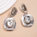 Personalized And Exaggerated Metal Hat Pendant For Women With High-end Texture Earrings_ipsvogv.com