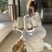 Women's Clothing hollow knitted top skirt two piece suit fashionable and age reducing temperament early spring wear a complete set_ipsvogv.com