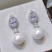 water drop shaped earrings is versatile and imitates pearl earrings. Female celebrities wear the same light _ipsvogv.com