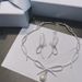 HEFANG Pearl Bowknot Ribbon Necklace For Women Wedding Fashion Niche Design Light Luxury Clavicle Chain_ipsvogv.com