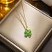 Lucky four-leaf clover necklace women's gold-plated cat's eye exquisite petal clavicle chain simple temperament women's new necklace_ipsvogv.com
