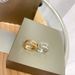 Three diamond sliding ring with rose gold and diamond inlay, personalized hollow and dynamic for men and women_ipsvogv.com