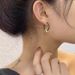 Retro Design Gold Knotted Earrings Simple And High End Black Circle Earrings Net Celebrity Temperament Earrings_ipsvogv.com