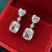 Cao Shi's new light luxury flash diamond pink yellow white Zircon Earrings women's fashion CaiBao earrings_ipsvogv.com