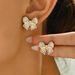 Japanese and Korean light luxury high-end feeling pearl bow temperament for women 2024 spring/summer new fashionable_ipsvogv.com
