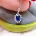 Cao Shi's New Four Claw Blue Zircon Pendant Necklace Wedding Anniversary Gift_ipsvogv.com